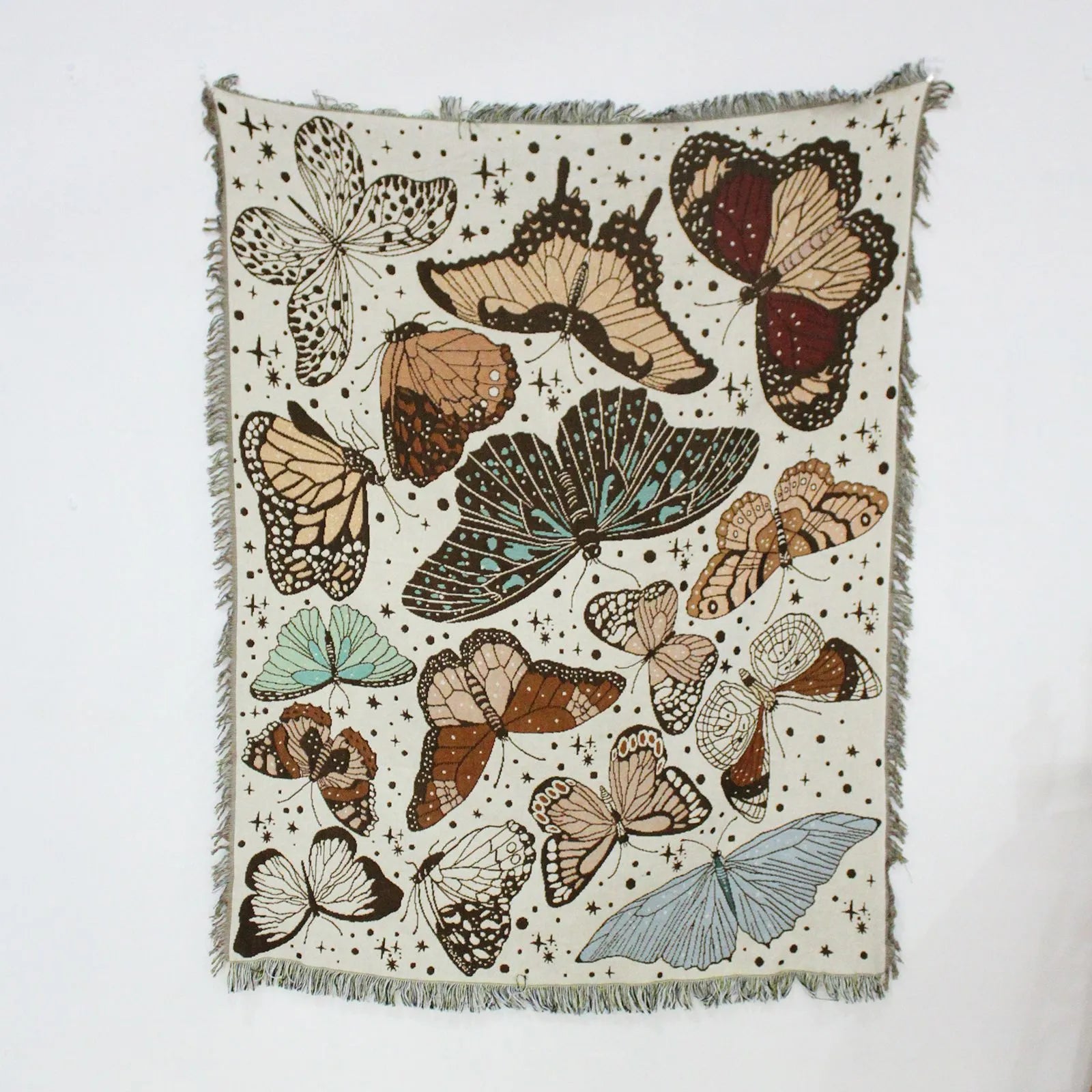 Blanket with butterfly designs on a white background