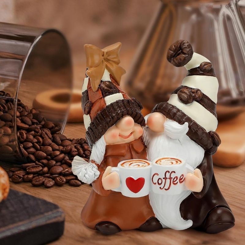 Coffee gnome figurine pair with molded details and tall hats holding cups