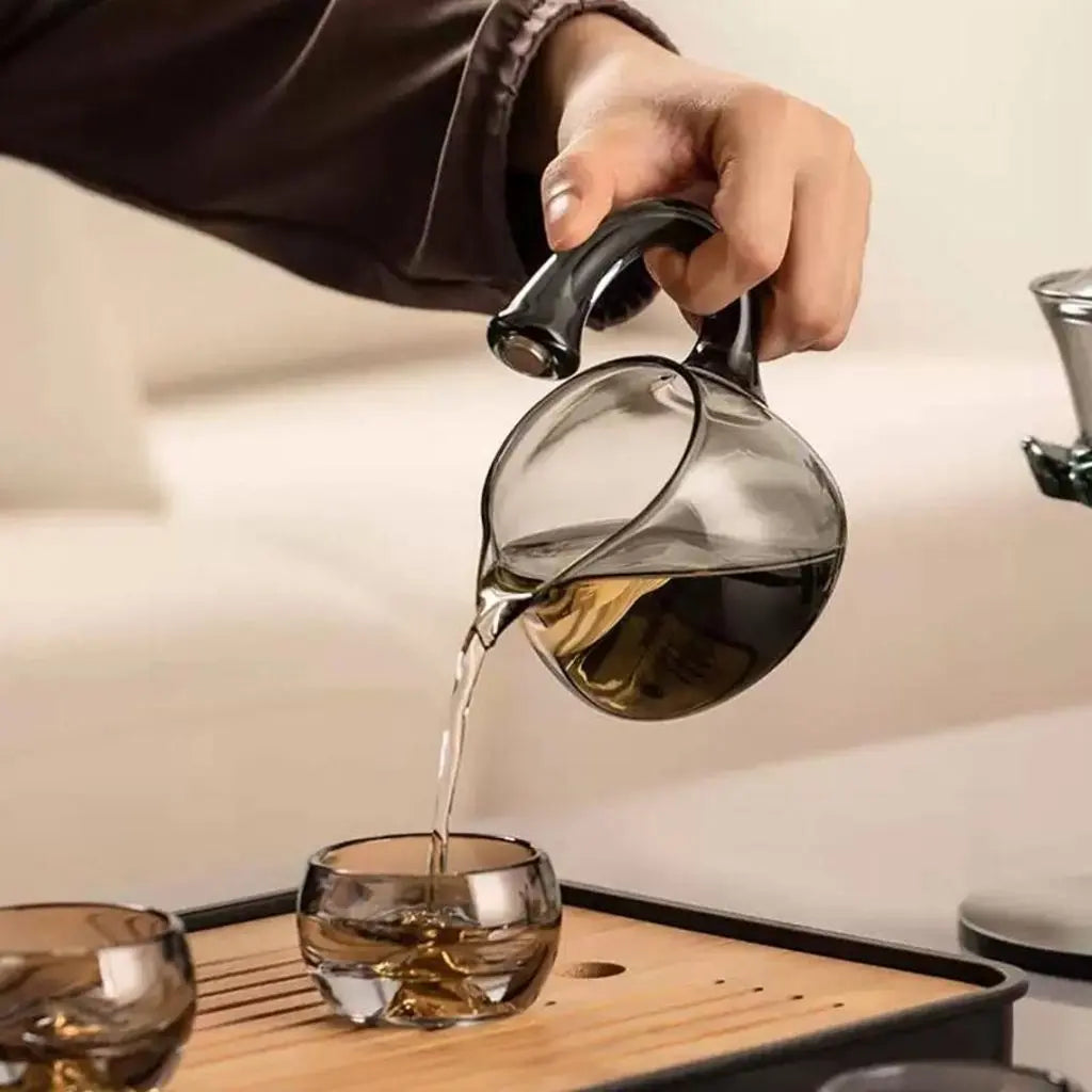 Complete lotus glass tea infuser set for tea enthusiasts, combining style and functionality in one piece