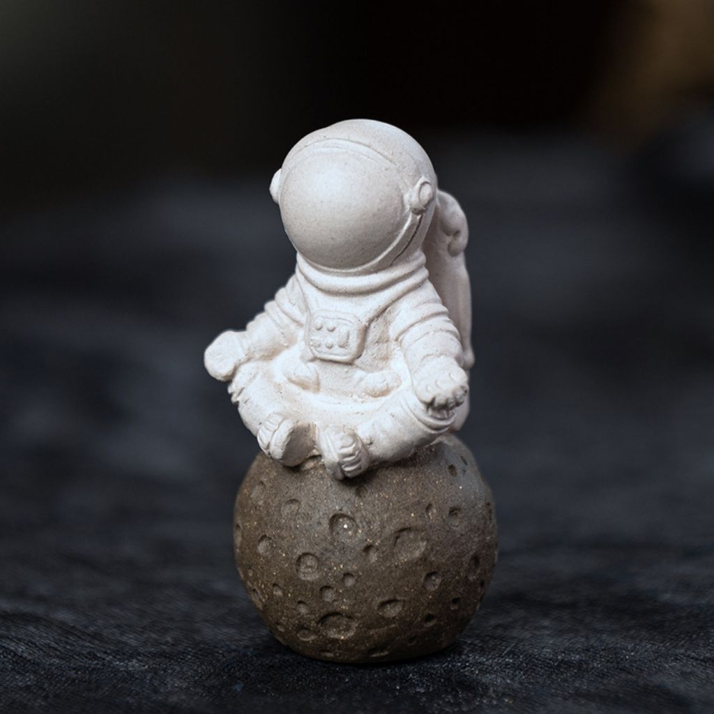 Tea ceremony astronaut figurine purple zisha clay tea pet handcrafted ornament sitting moon surface