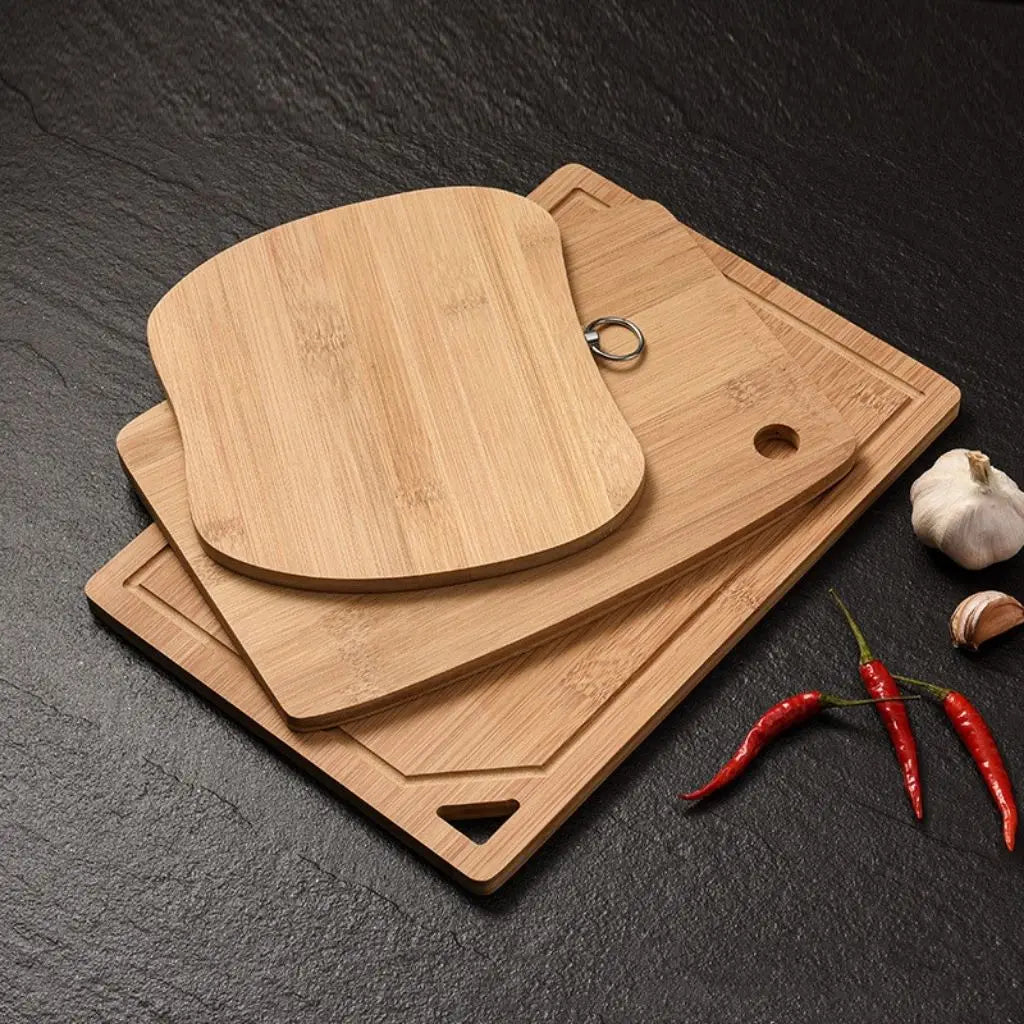 Natural bamboo square cutting board featuring durable construction and lightweight design for kitchen prep