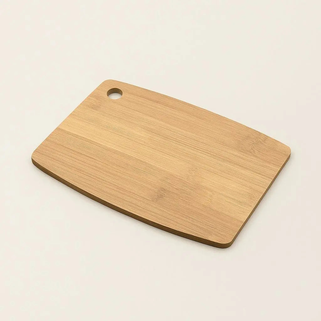 Bamboo chopping board with knife-protecting surface and easy storage ring, eco-friendly kitchen organization