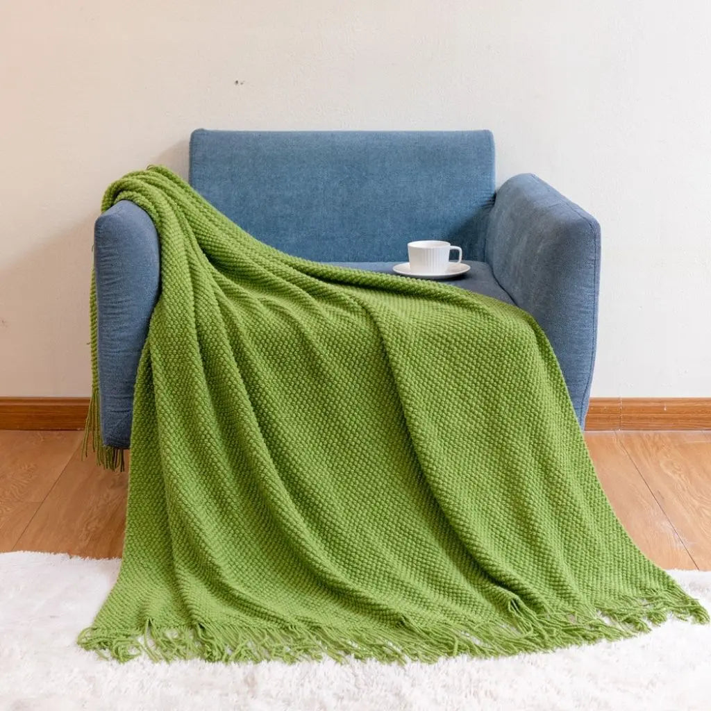 Sofa throw blanket with knit texture perfect as home accent for reading chair or bed