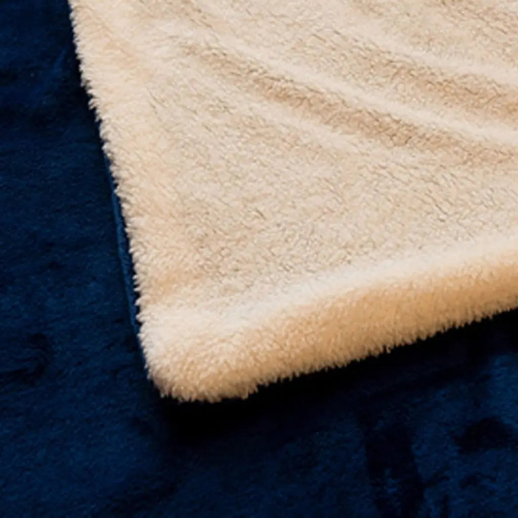 Lightweight polyester flannel blanket with sherpa lining ideal for year round use and travel