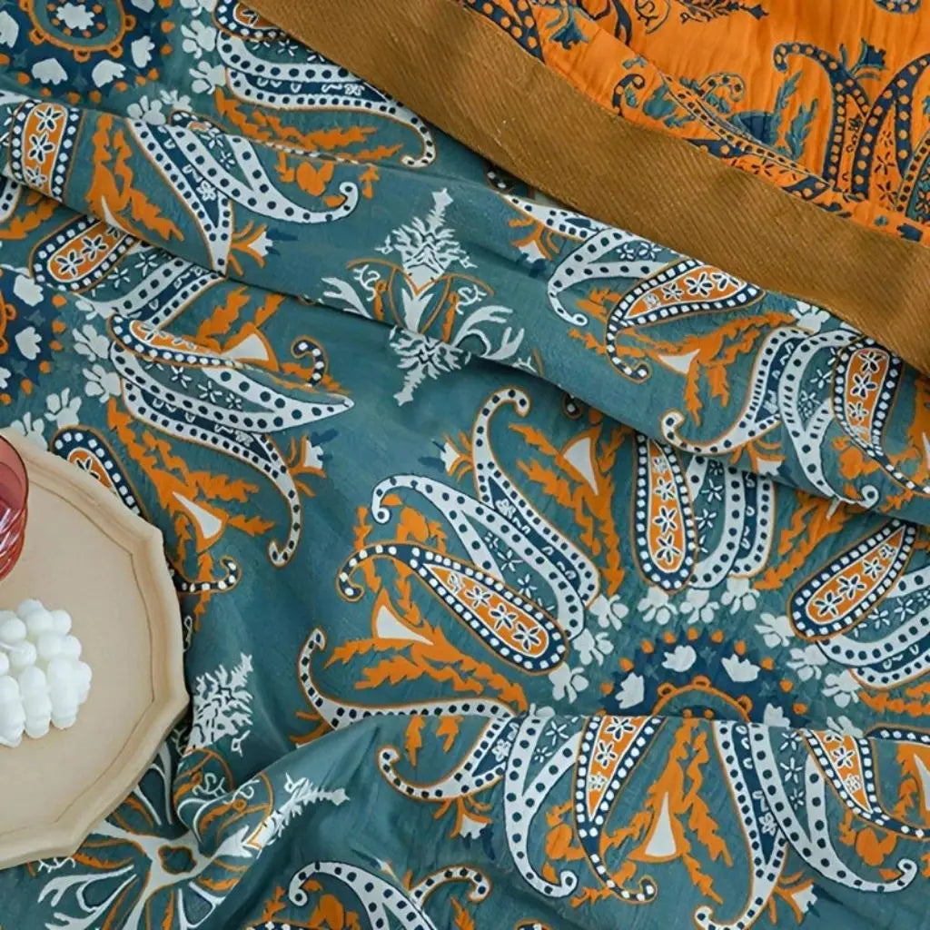 Woven cotton blanket featuring geometric print design for versatile home textile comfort and function