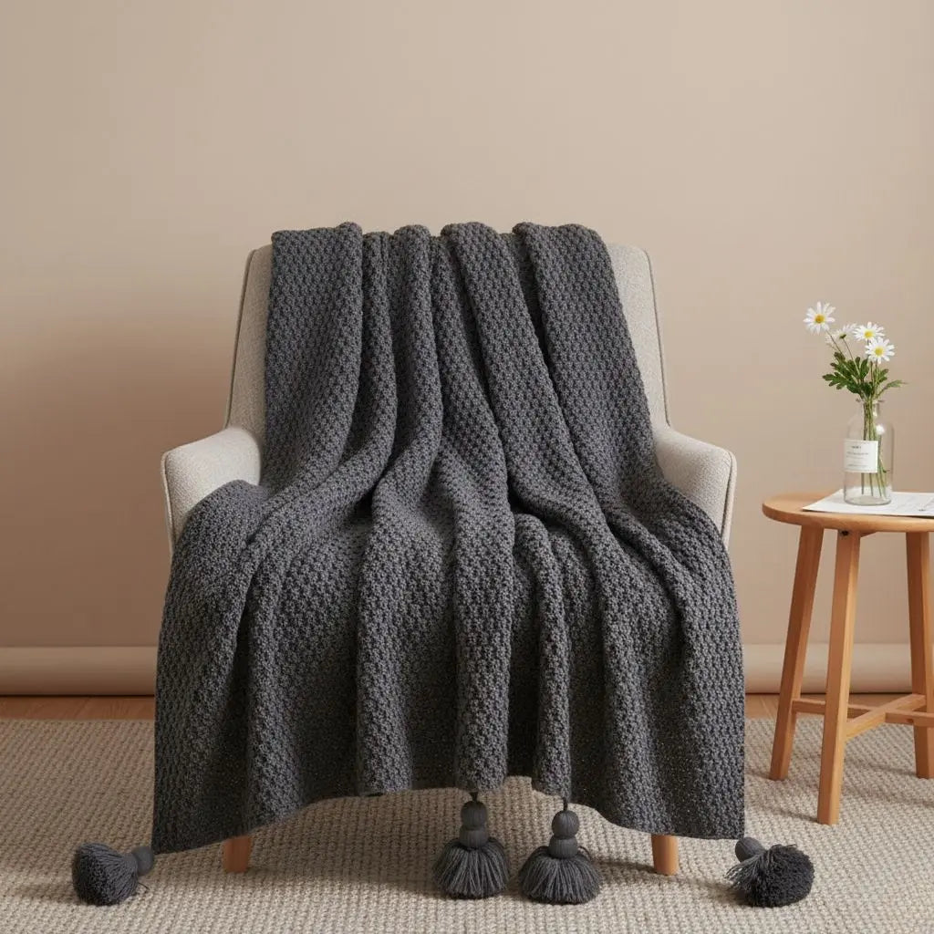 Acrylic knit blanket with pineapple tassel design for sofa and bed in neutral tones