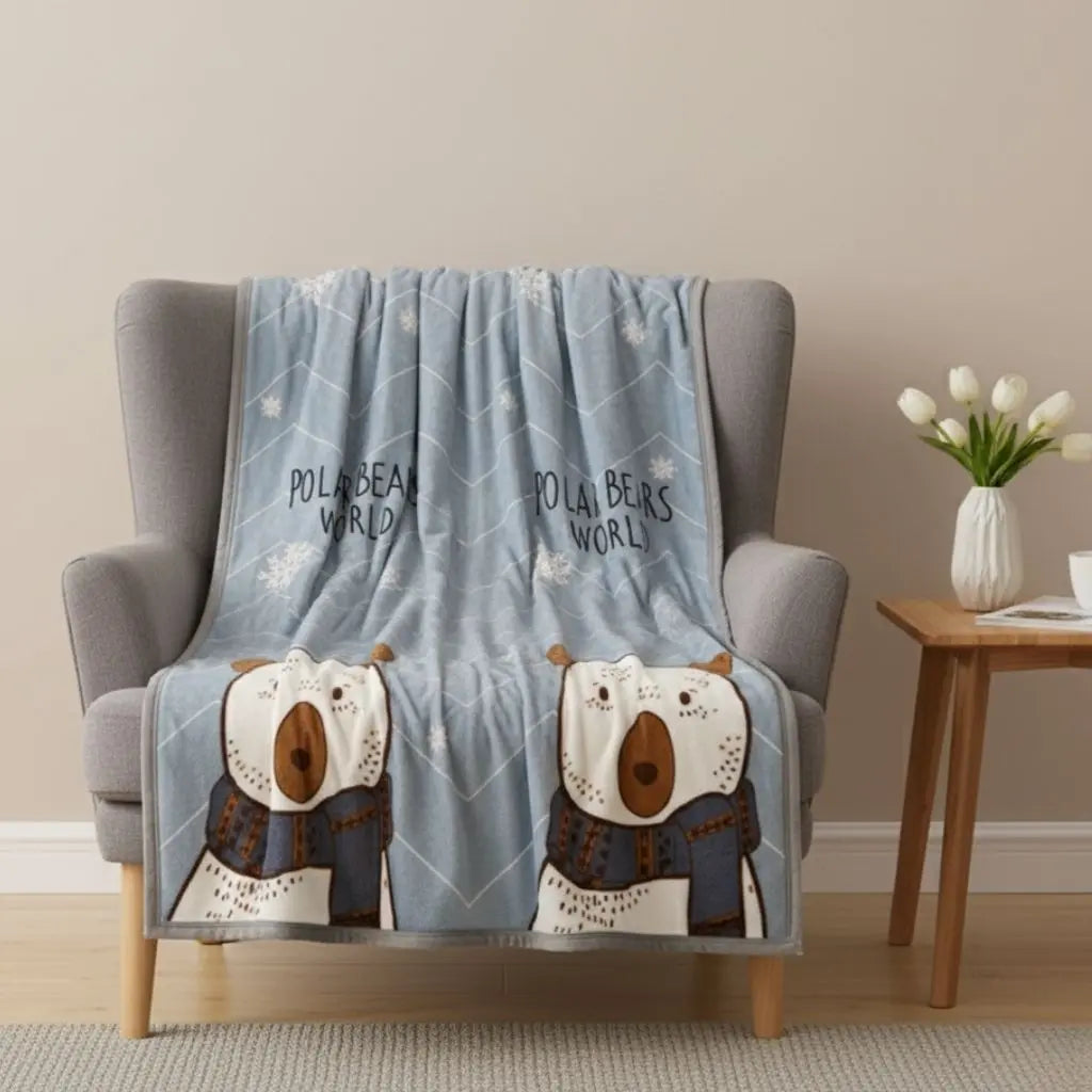 Soft polar bear flannel blanket with snowflake pattern for cozy winter bedding and home comfort