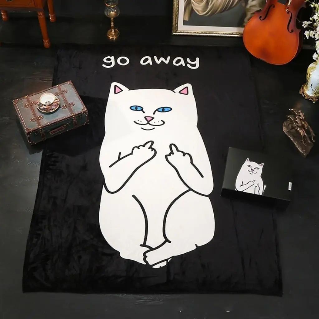 Black blanket with a white cat illustration and 'go away' text on a dark surface.