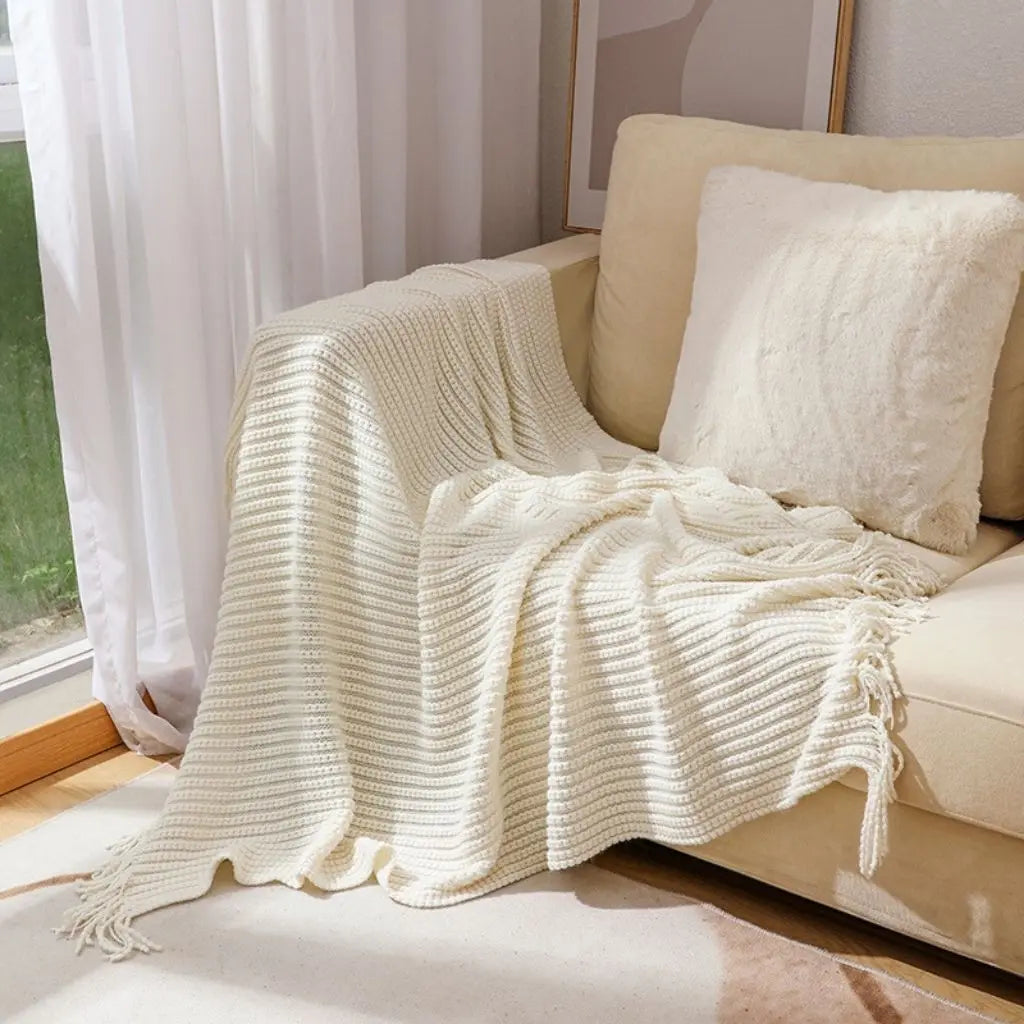 Fringed chenille throw blanket with textured weave perfect for living room and bedroom decor