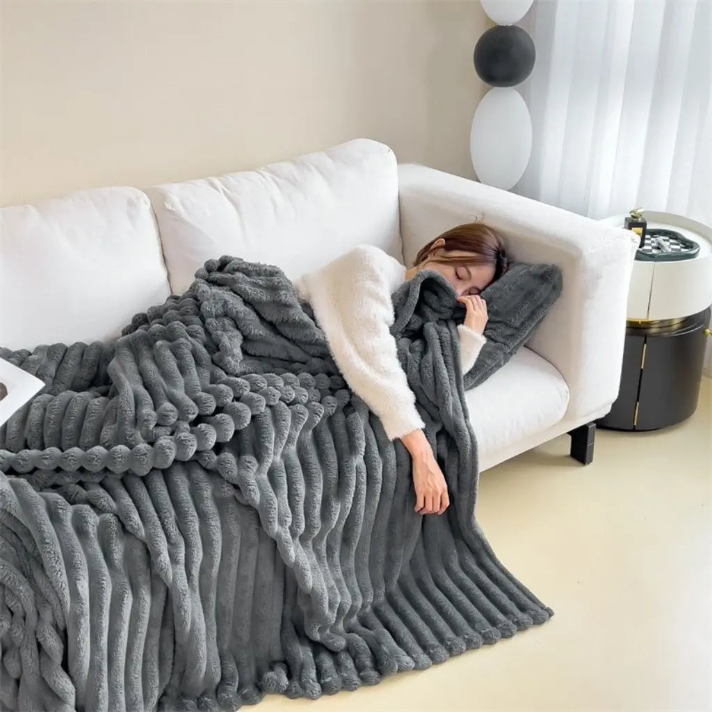 Heavy flannel throw blanket with ribbed polyester texture for winter bedding