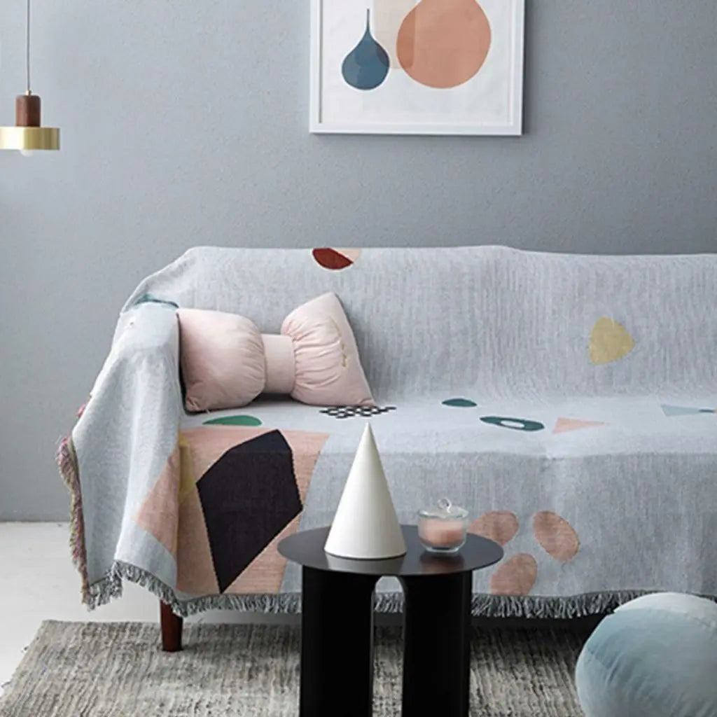 Modern cotton blend throw blanket with geometric design for sofa styling