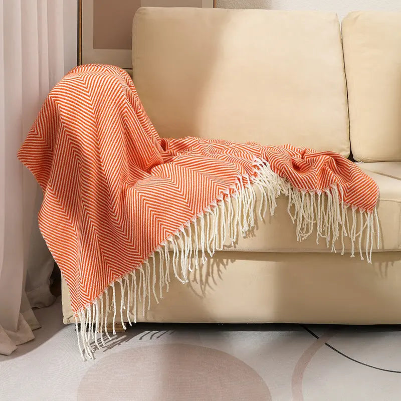 Herringbone weave throw blanket with decorative fringe for living room and bedroom use