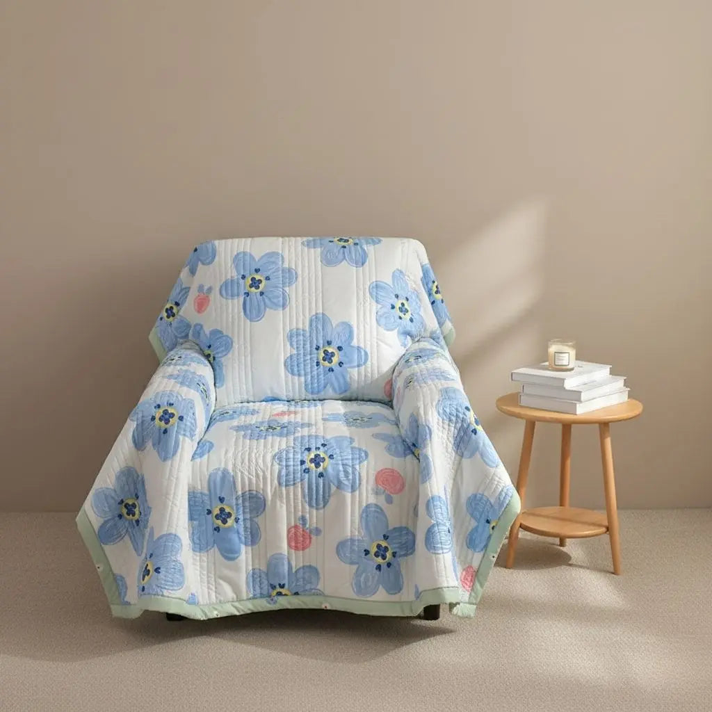 Floral cotton blanket featuring reactive print technology for long lasting vibrant bedroom decor
