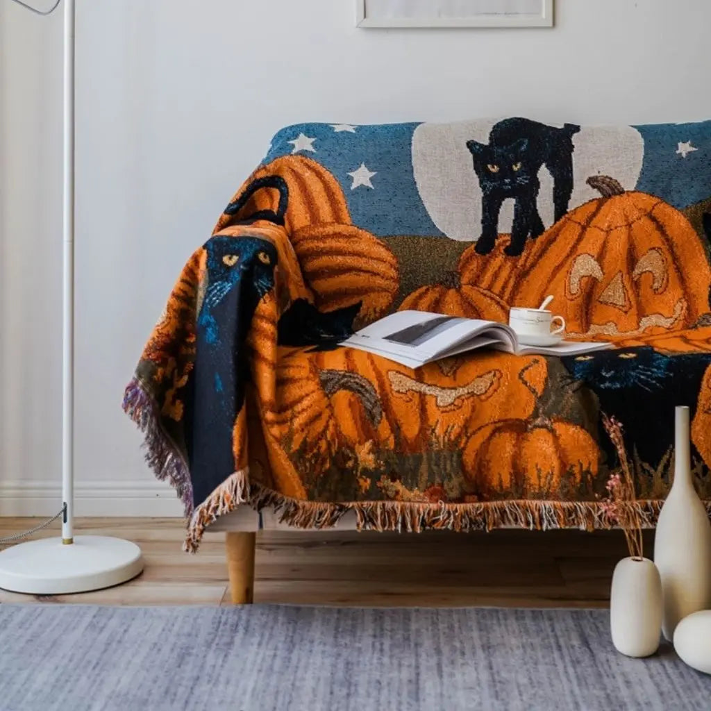 Black cat and moon design throw blanket textured weave machine washable Halloween bedding accent