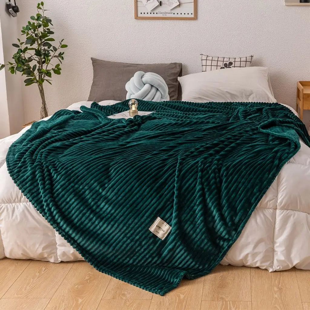 Versatile fleece throw with fine construction serving as minimalist comfort essential for home styling