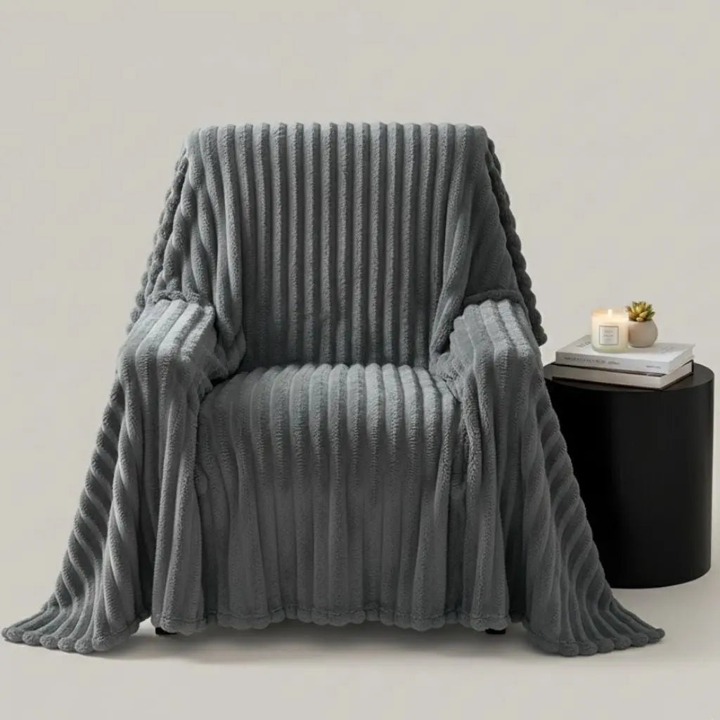 Textured polyester flannel blanket with heavy weight construction for comfort