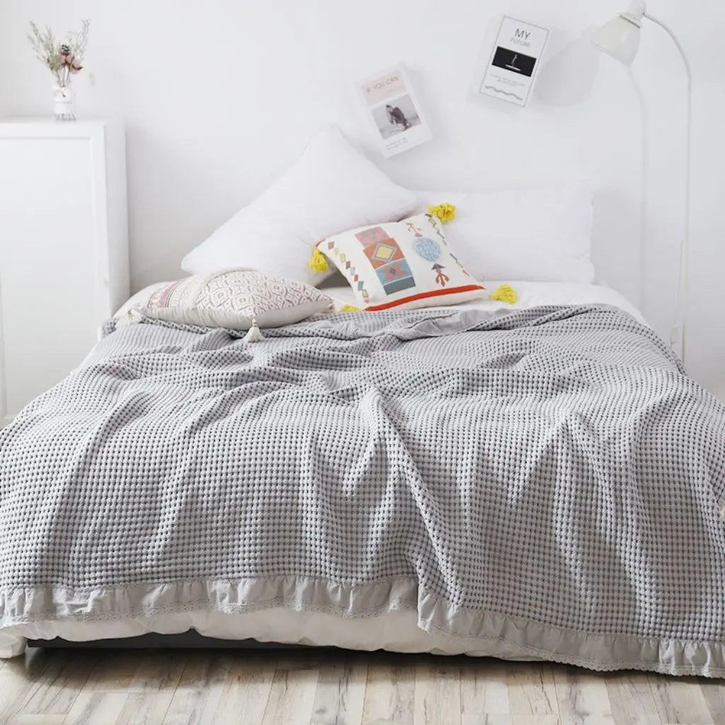 Textured cotton waffle blanket with decorative lace for sofa or bed use