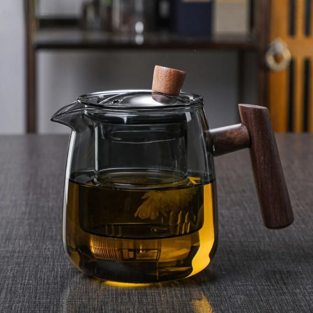 Modern heat proof glass teapot with clear construction designed for elegant tea preparation
