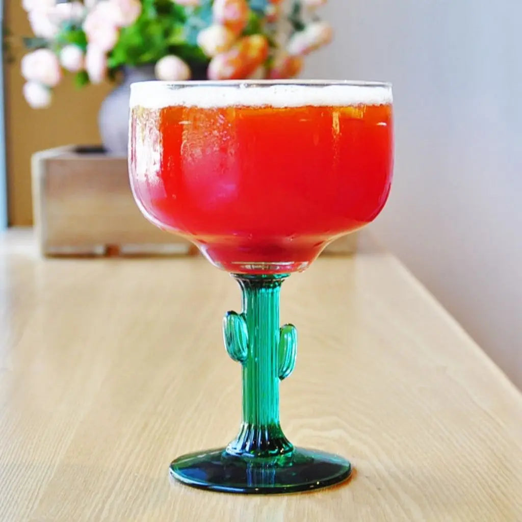 Green cactus stem cocktail glass with 16oz capacity perfect for margaritas and desert themed parties