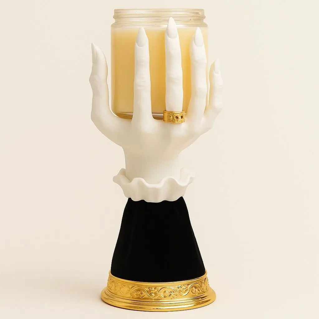 Witch hand candle holder with gold trim base, handcrafted resin Halloween decor for spooky home atmosphere