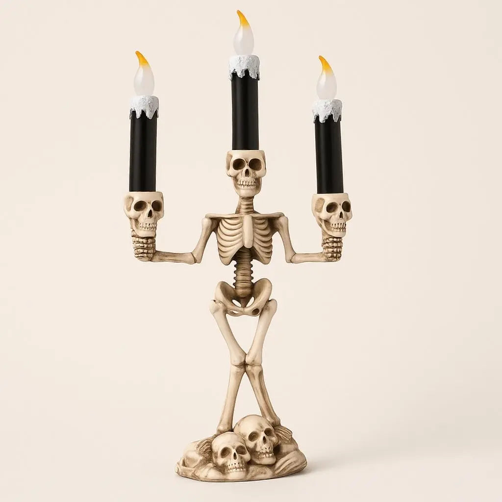 Trio skeleton candle display with bone structure design and LED flame effects for Halloween decor