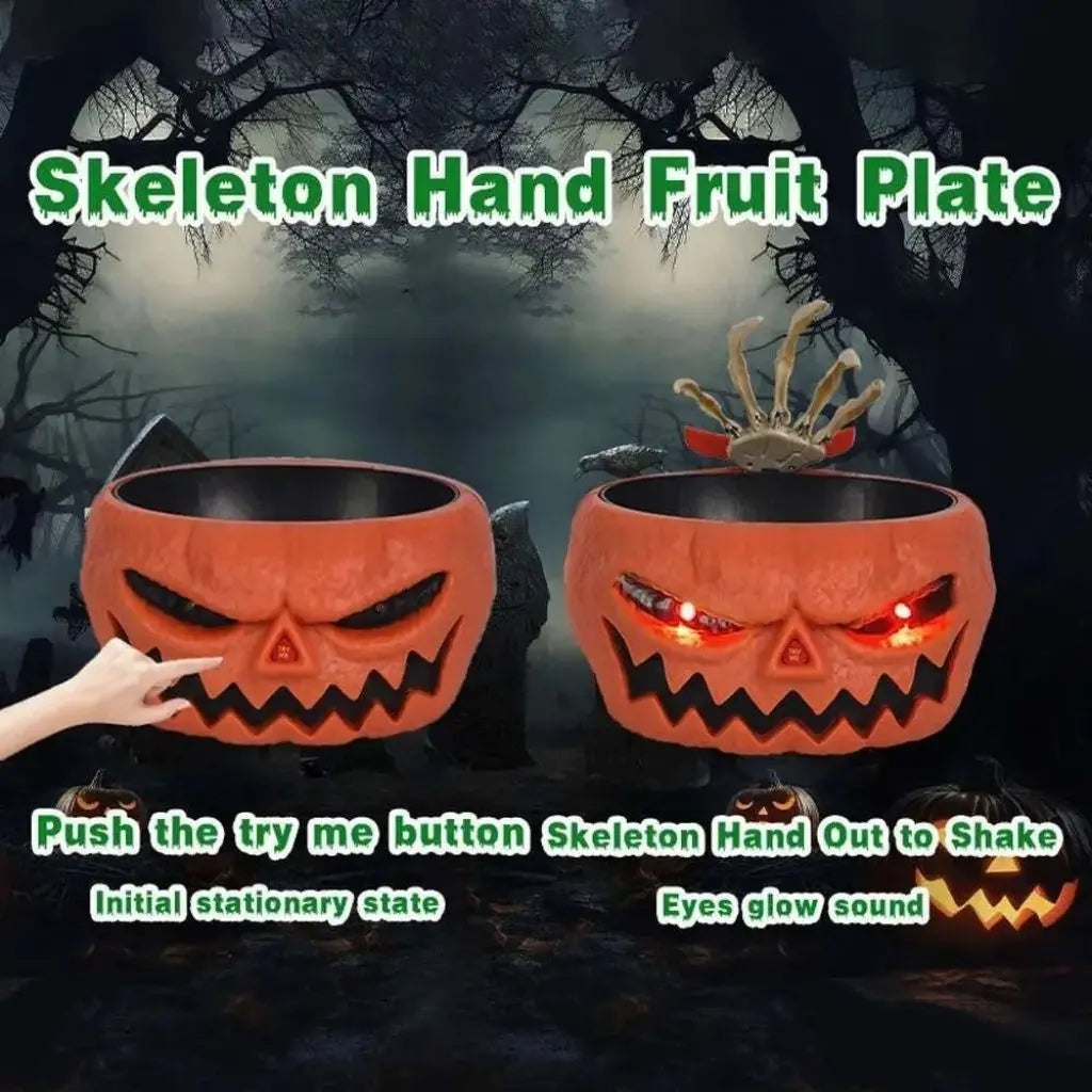 Skull design Halloween candy bowl with animated skeleton hand creates spooky centerpiece for parties