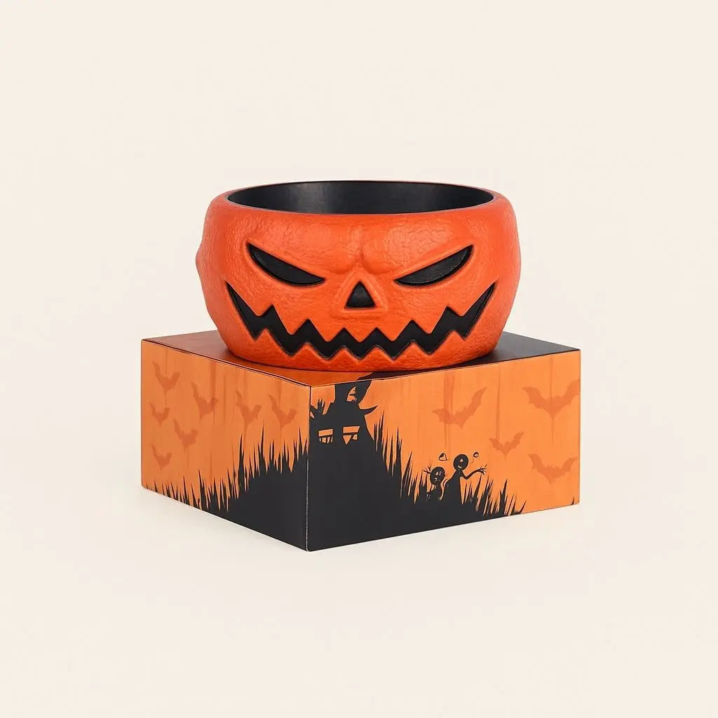 Motion activated Halloween candy bowl with skeleton hand and glowing red eyes for spooky trick or treat fun