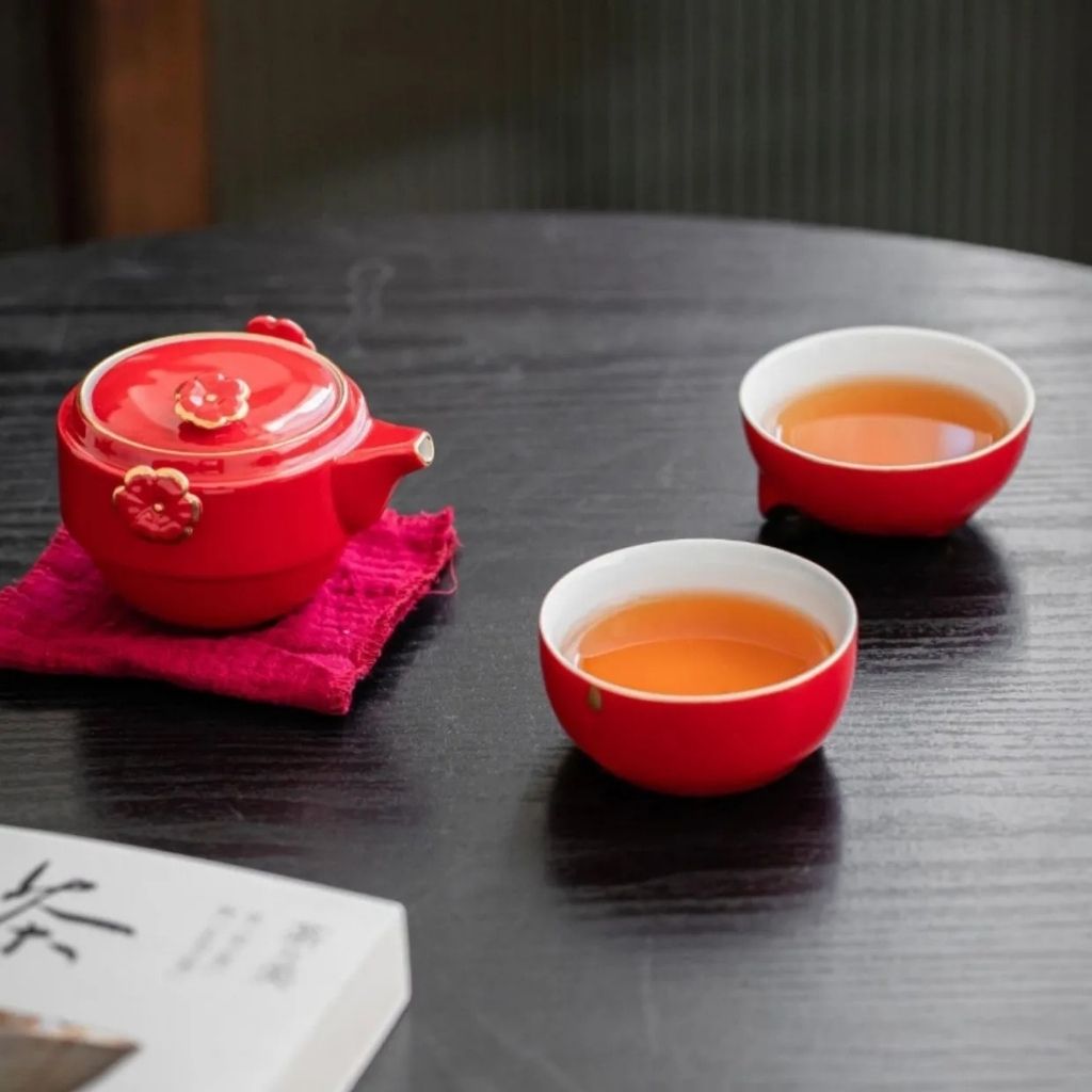 Ceramic travel tea set size comparison showing compact portable design for tea brewing on the go