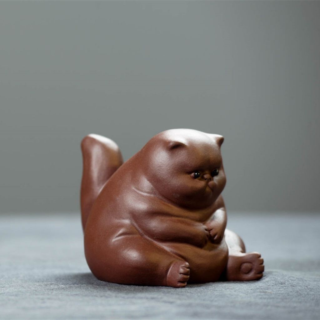 Purple clay handcrafted cat tea pet showing detailed craftsmanship and traditional design elements