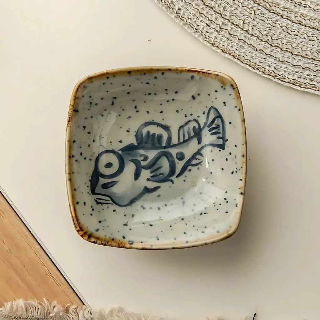 Functional ceramic sauce plate designed for soy sauce, dips, and small bites with coastal flair