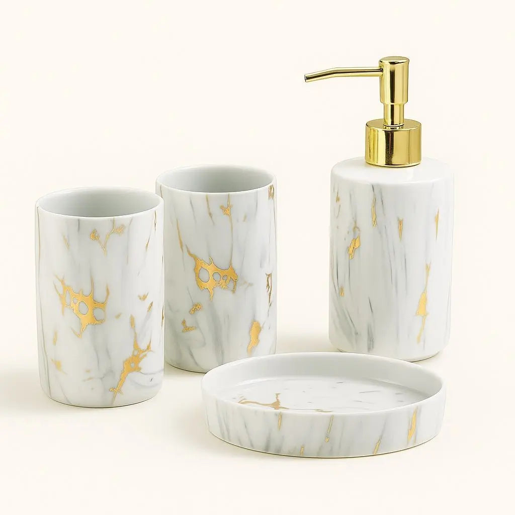 Marble-patterned bathroom set with gold accents on a white background