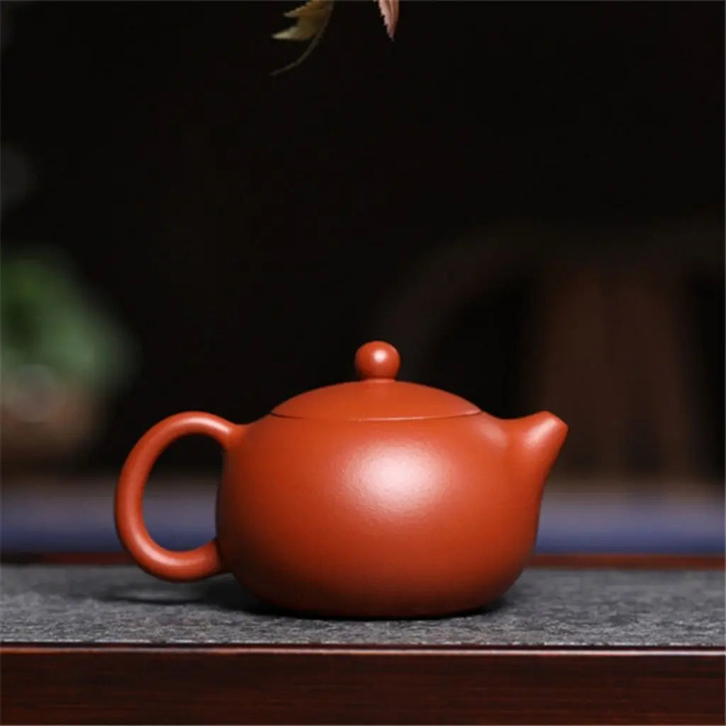 Compact 400ml red clay ceramic teapot perfect for personal tea brewing and intimate tea serving sessions