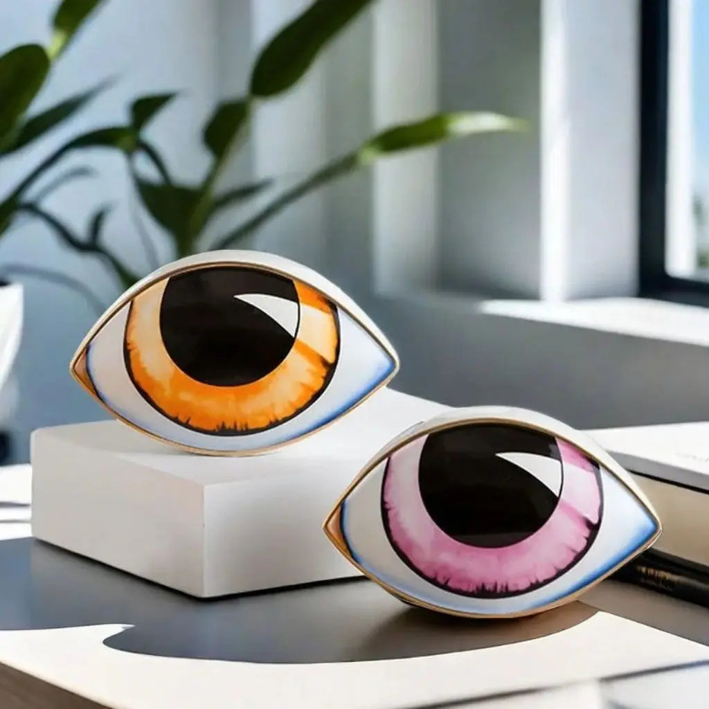Glossy ceramic eye sculpture with modern appeal striking artistic figurine for decorative accents