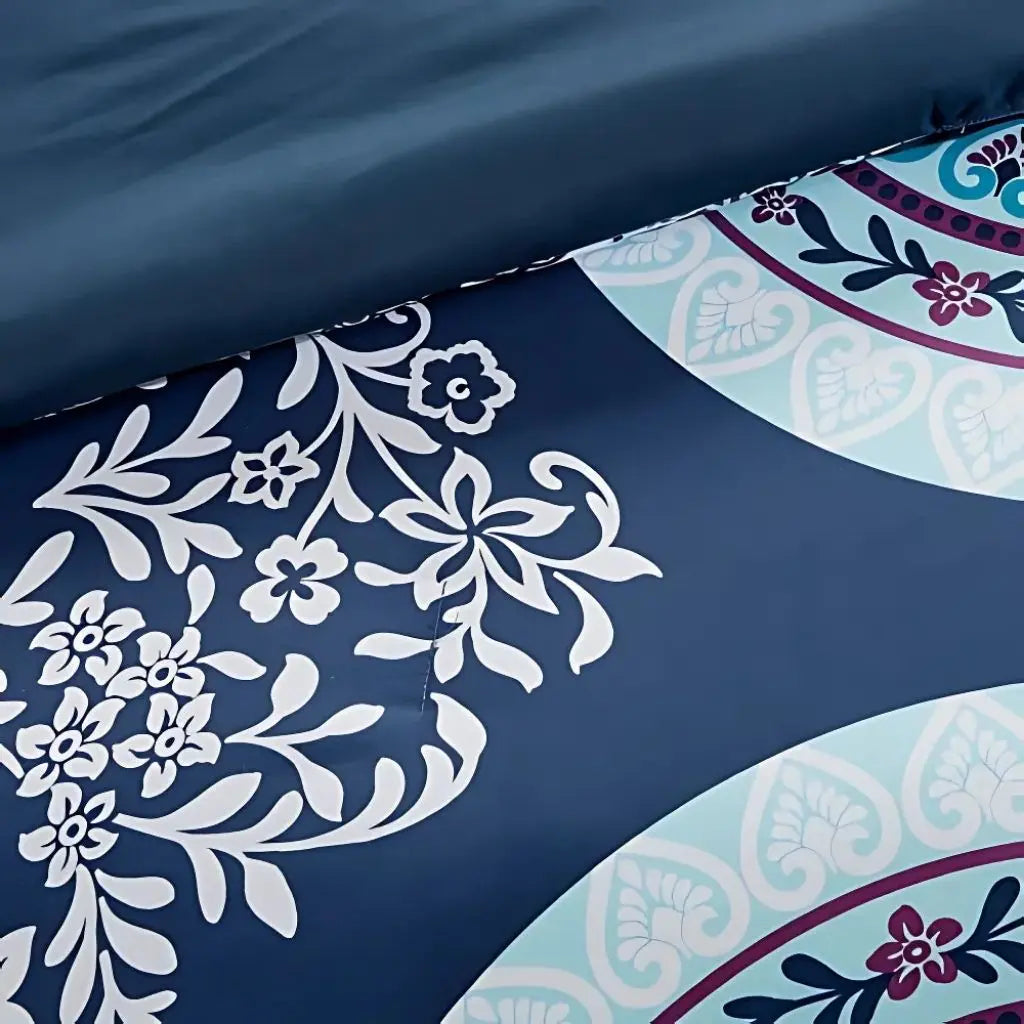 Embroidered medallion pattern detail on boho comforter showcasing intricate bohemian textile craftsmanship