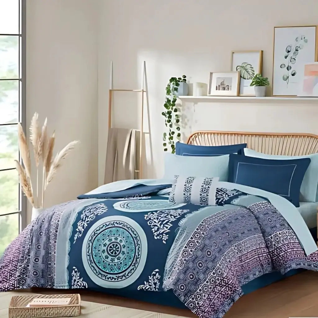 Embroidered pillow shams and decorative pillows from boho comforter set with matching medallion patterns