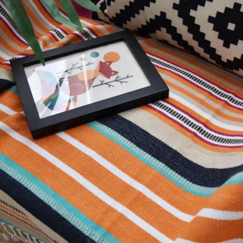 triped acrylic throw with tassel detail and multicolor design for home layering