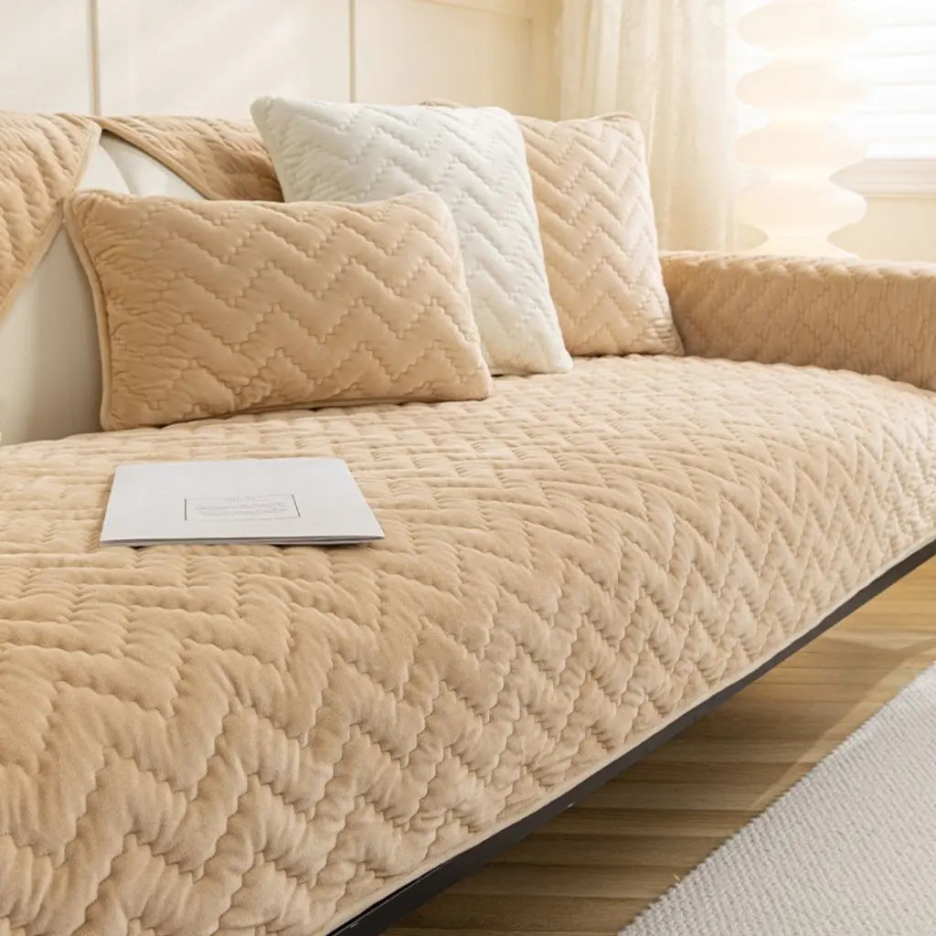 Quilted velvet sofa throw offering seasonal furniture protection with crystal velvet comfort