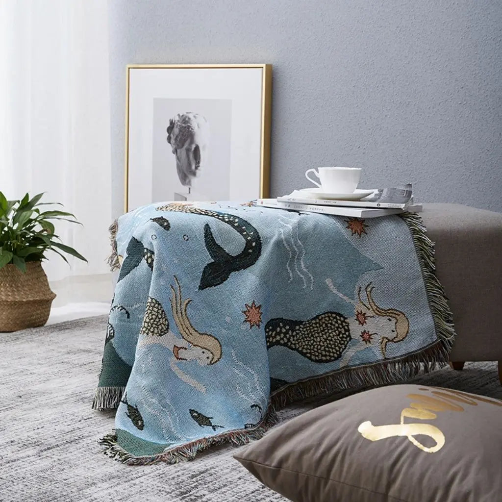 Ocean themed blanket with fantasy mermaid design offering comfort and decorative accent