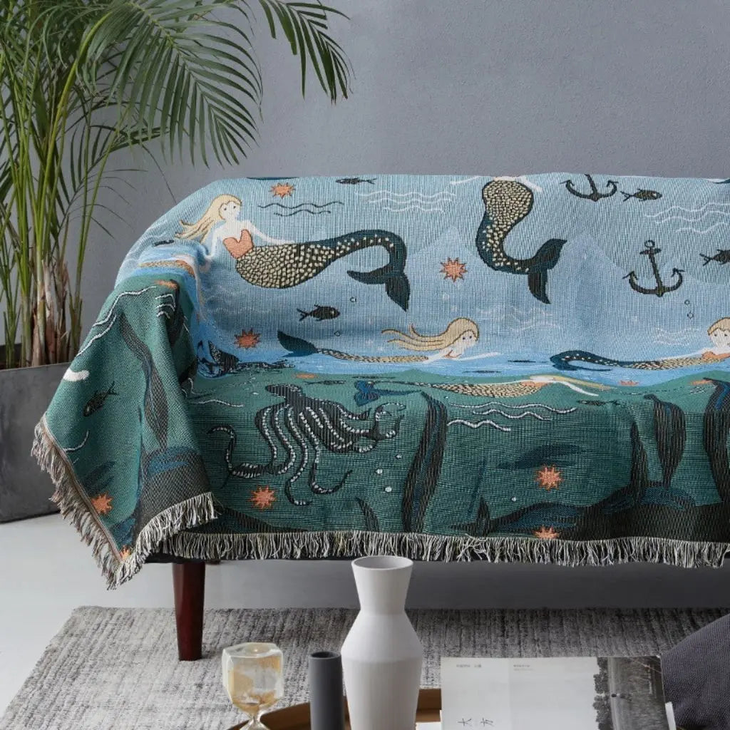 Decorative sofa throw with whimsical underwater scene in durable polyester cotton blend