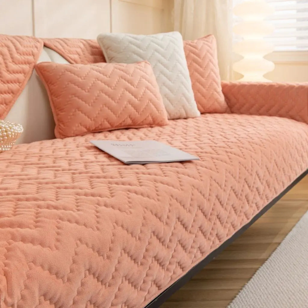 Crystal velvet quilted cover providing protective coverage and comfort for sofa furniture