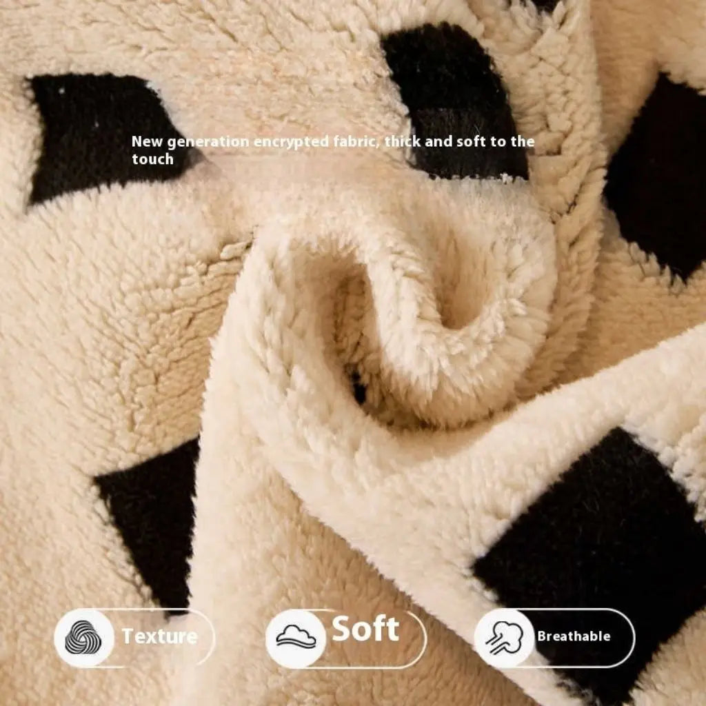 Living room transformation with geometric sofa cover creating cozy and refined home decor atmosphere