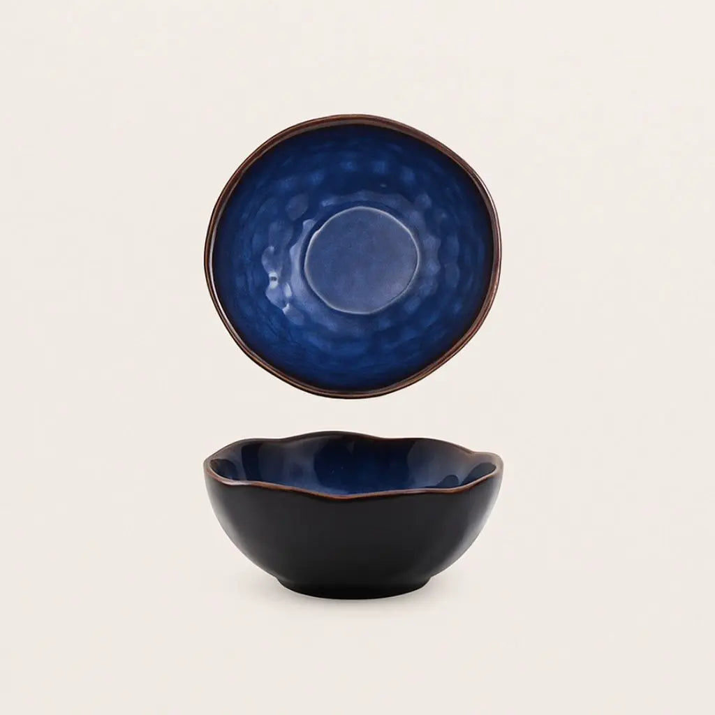 Unique ceramic serving dish with irregular artistic form, handcrafted for modern table settings