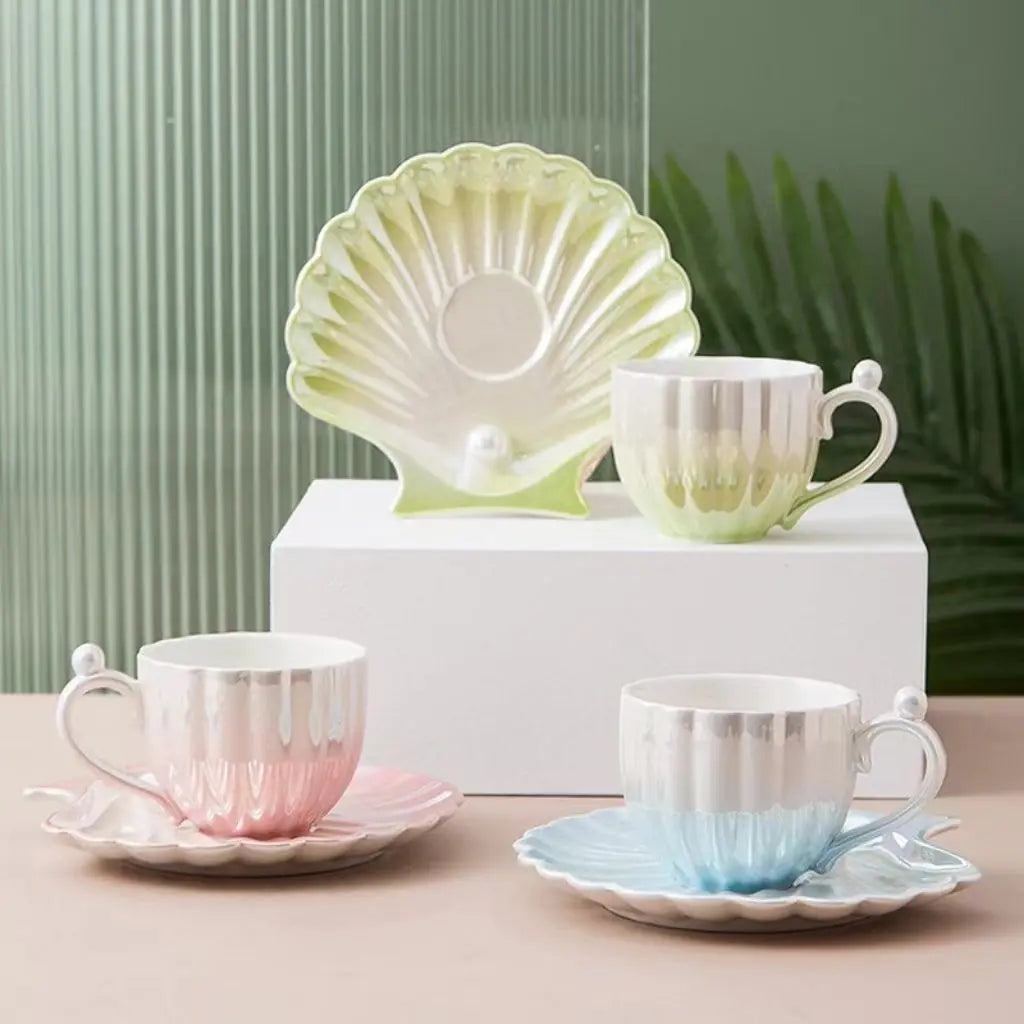 Handcrafted fine bone china teacups with shimmering pearl glaze, artisan quality for tea connoisseurs