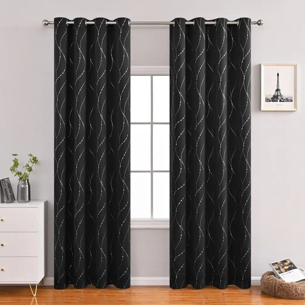Black blackout curtains featuring wave pattern fabric, delivering complete light blocking for modern interiors
