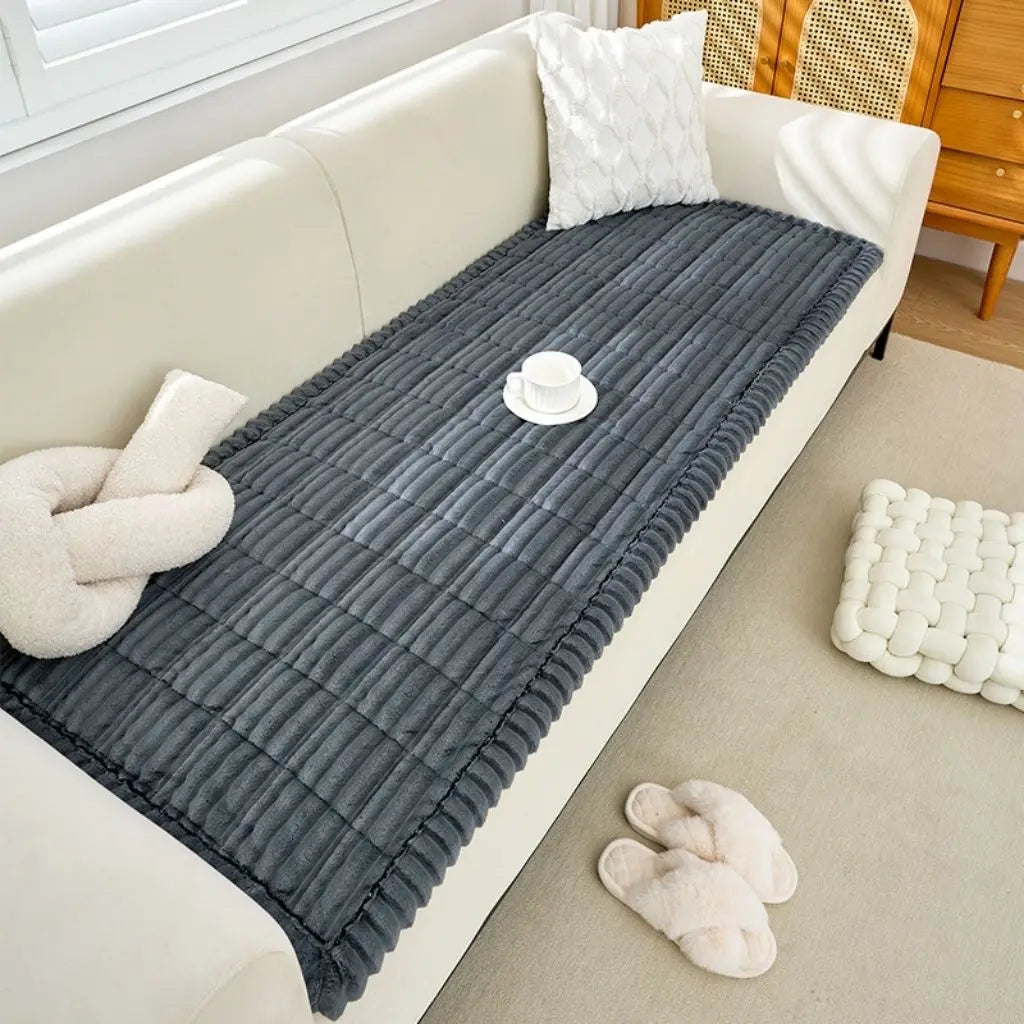 Fleece lined sofa cushion cover with quilted texture and anti slip backing for winter comfort