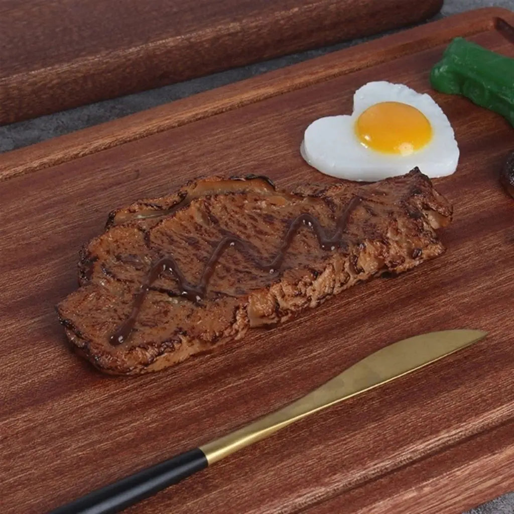 Smooth finish solid wood cutting board showcasing natural grain variations for kitchen use