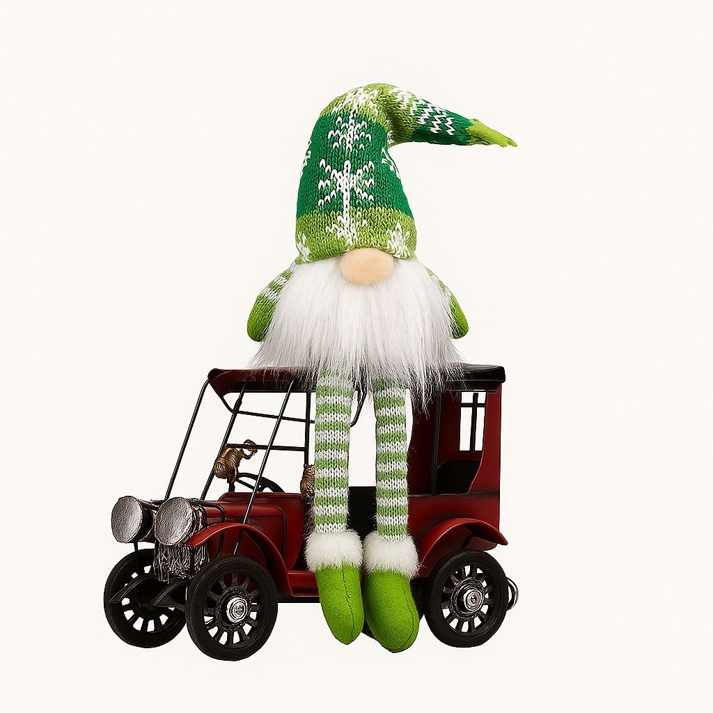 Light up Christmas gnome with soft glow sitting on shelf display