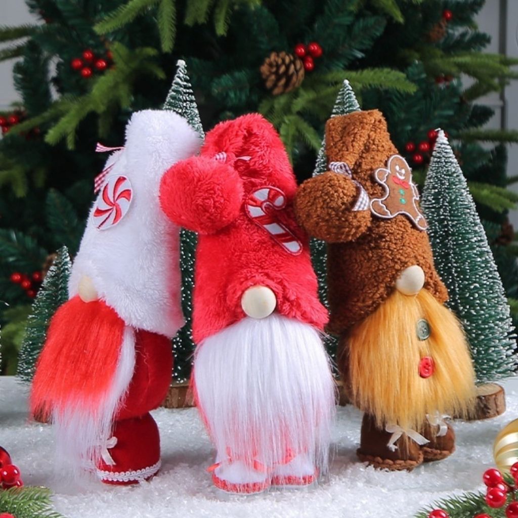 Festive gnome ornament with candy themed embroidery and warm color palette