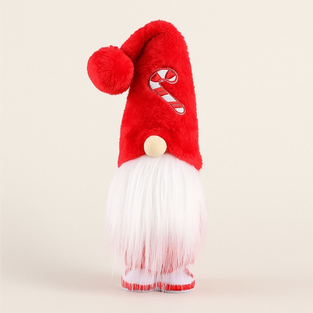 Holiday gnome ornament showing soft fabric construction and festive