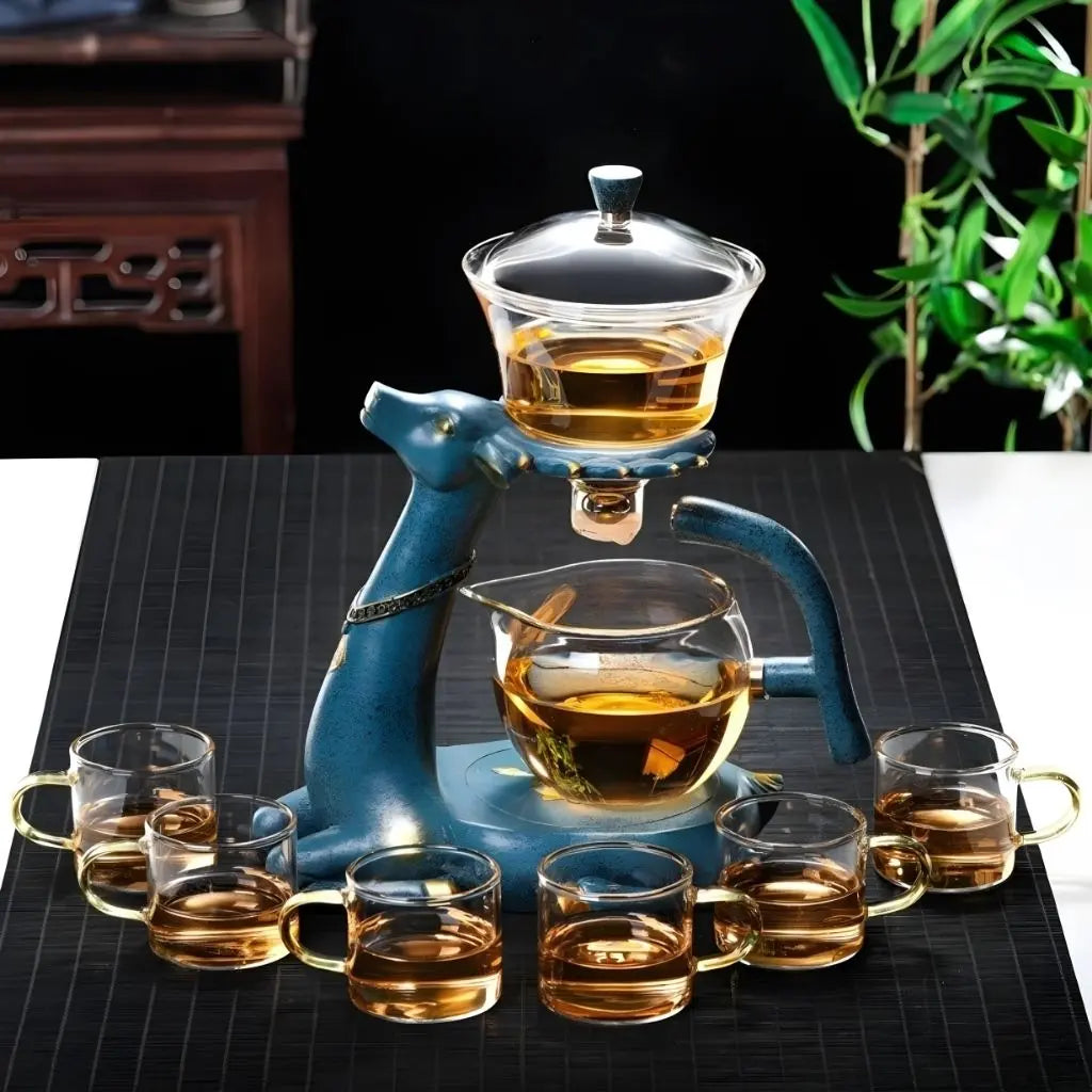 Transparent glass teapot with decorative deer base heat resistant borosilicate tea infuser set